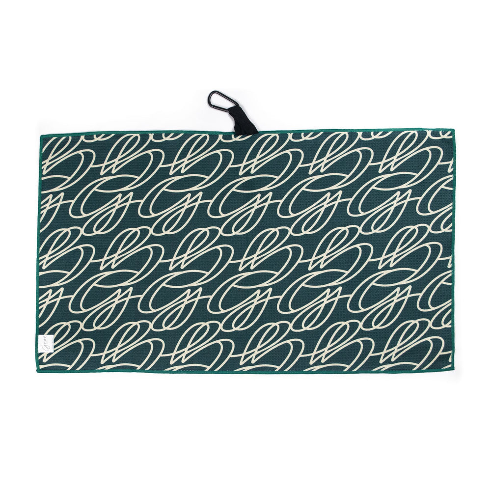 green waffle microfiber towel with an extra-large surface area, allowing the golfer to use it wet, dry, or both to keep their clubs clean throughout the round. 